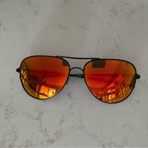 Oakleys Aviator Sunglasses with Orange Lenses